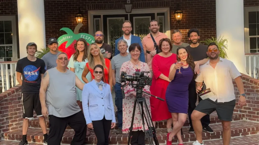 A diverse group of actors smiling together at The Bright Stars Greenroom retreat, celebrating personal growth, confidence, and connection in a creative environment.