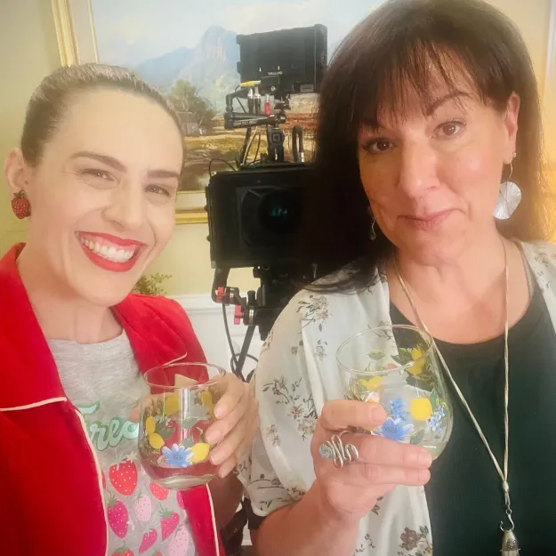 Shannon Scott and Toni Deckers toasting on set before filming begins at The Bright Stars Greenroom first of many acting and wellness retreats for creatives