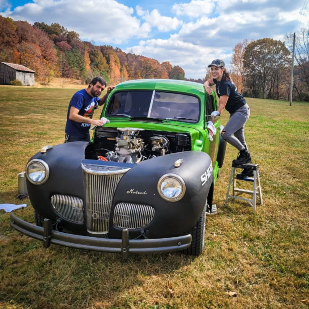 Behind-the-scenes of actors Shannon Scott & Alberto Luis filming a car wash scene during a hands-on movie retreat experience
