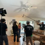 Actors preparing for a take on set during The Bright Stars Greenroom retreat’s behind-the-scenes filming experience