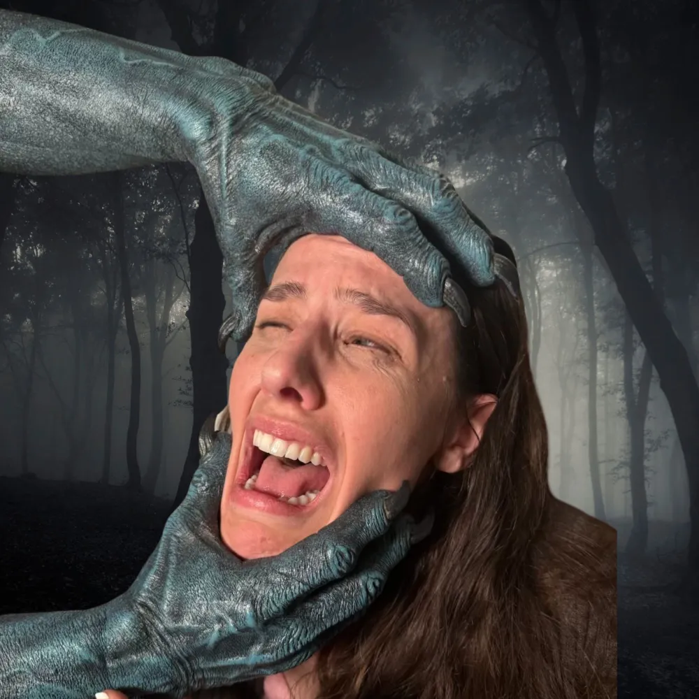 Shannon Scott in fear with monstrous hands grasping their skull, capturing the raw vulnerability of facing inner demons.