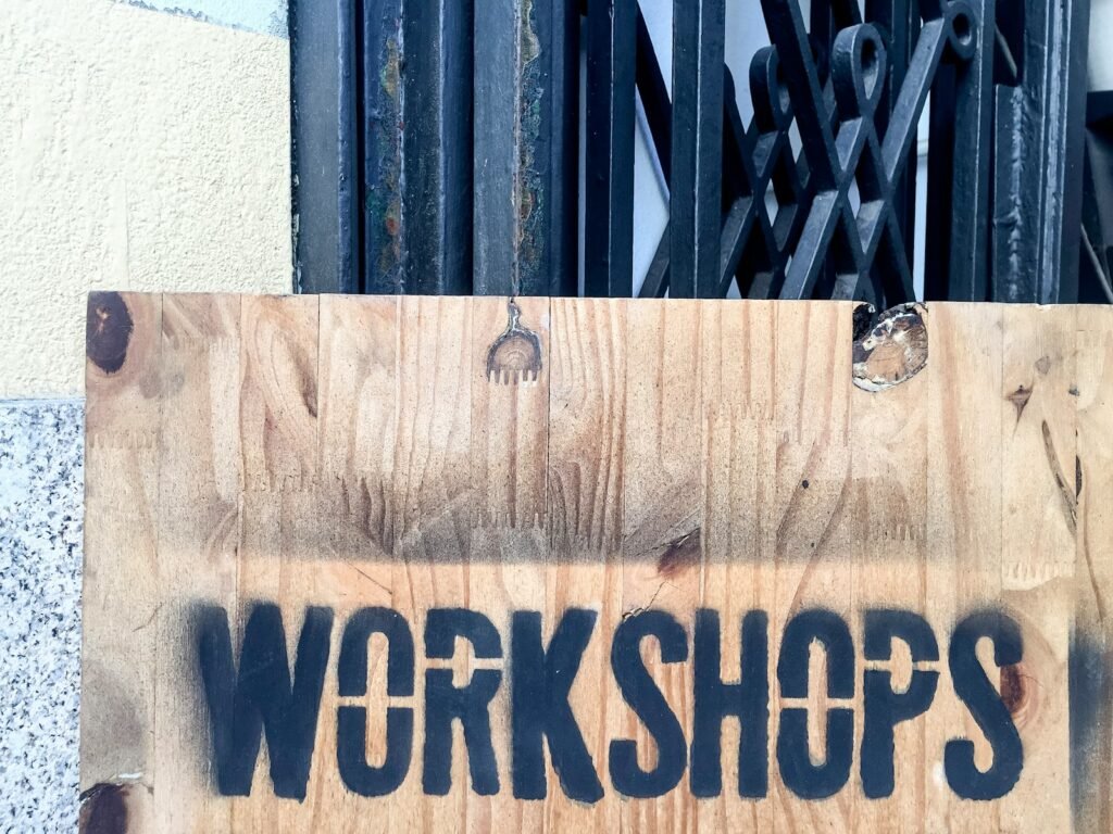 brown wooden welcome to the beach signage showing your way to your next in person acting workshops