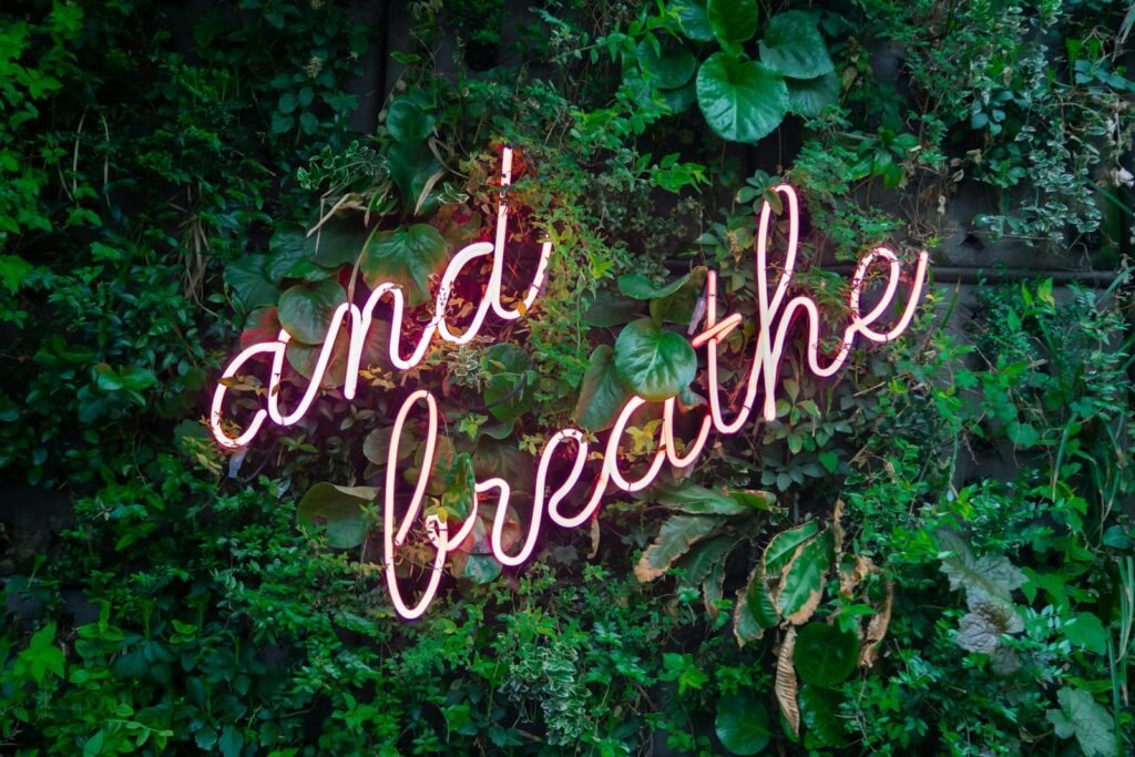 Sign with the words "Just Breathe" symbolizing calm and mindfulness on an actor’s journey
