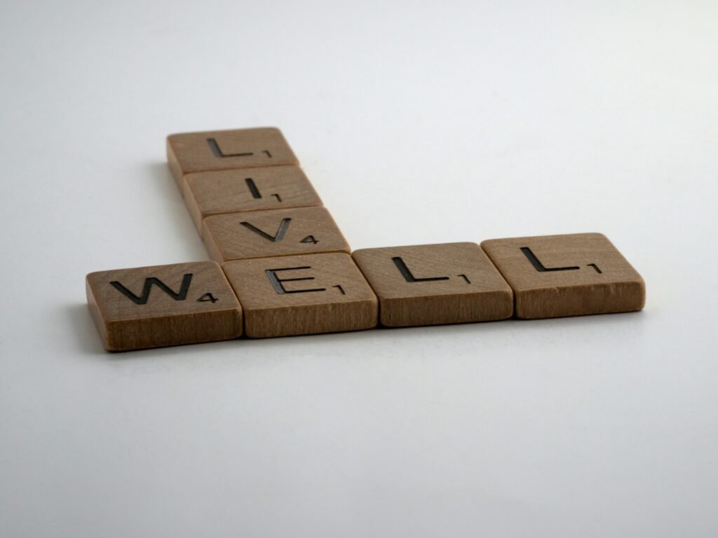 "Live Well" sign representing actor wellness and self-care
