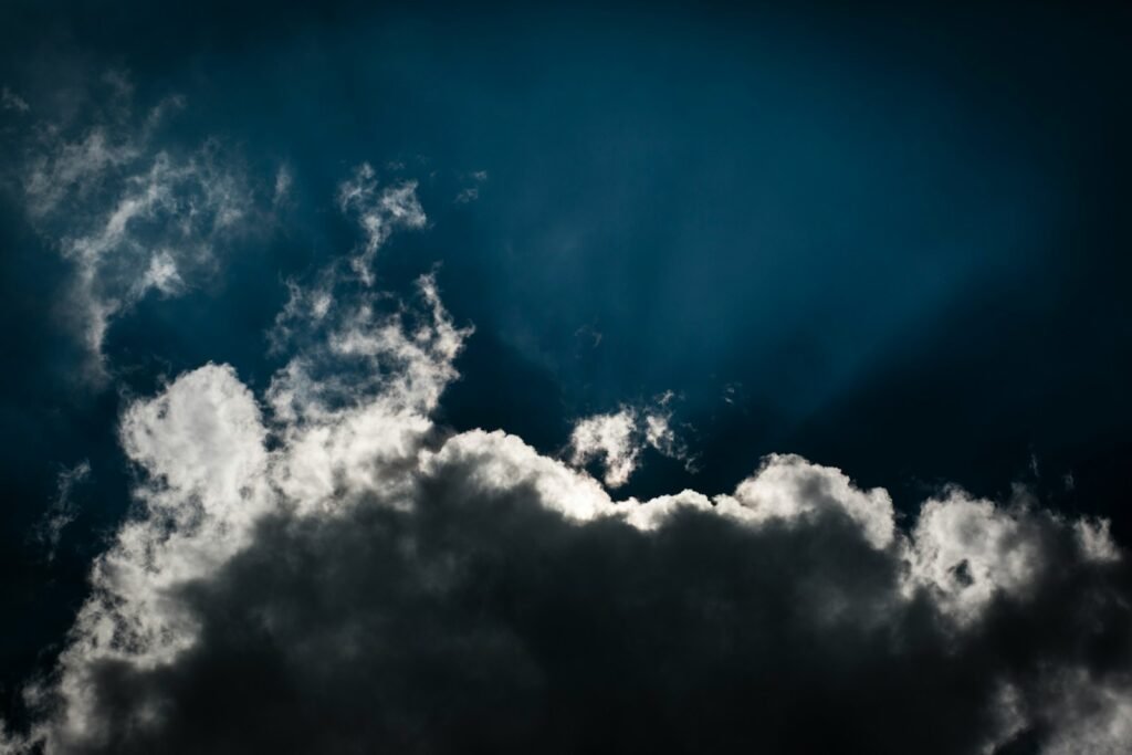 The sun breaking through thick clouds, symbolizing breakthrough acting techniques that help performers rise beyond creative blocks.
