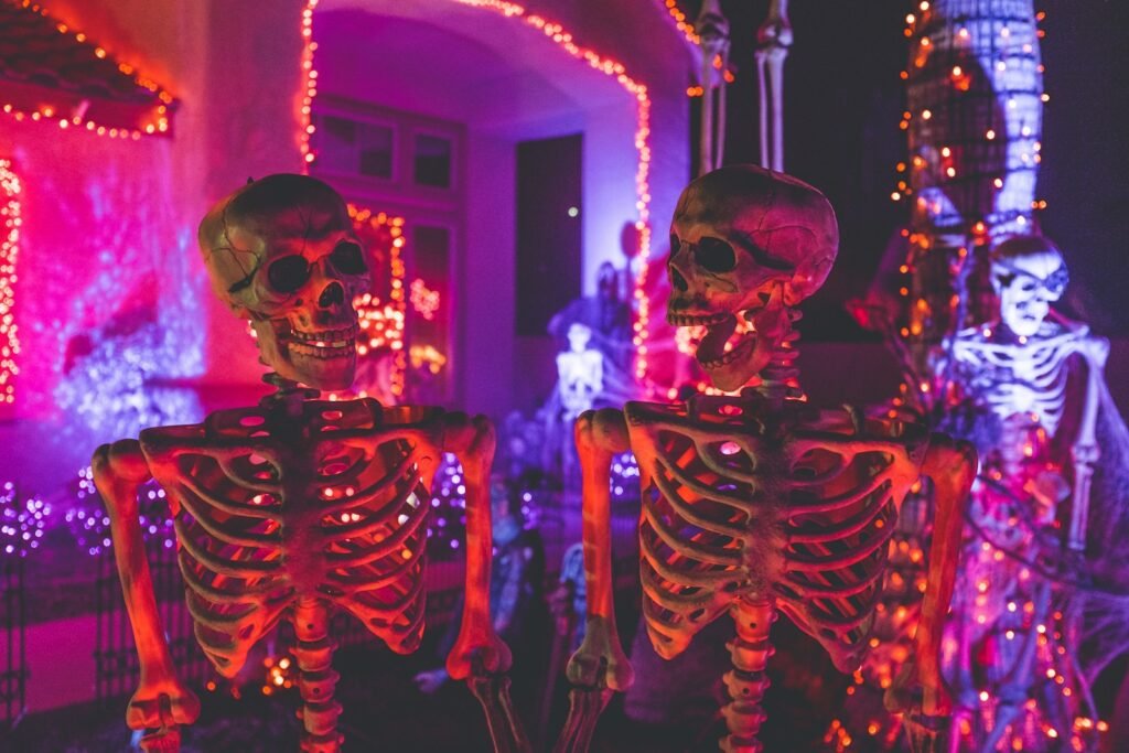 Two skeletons facing each other, symbolizing reflection, honesty, and transformation through personal growth retreat experiences.