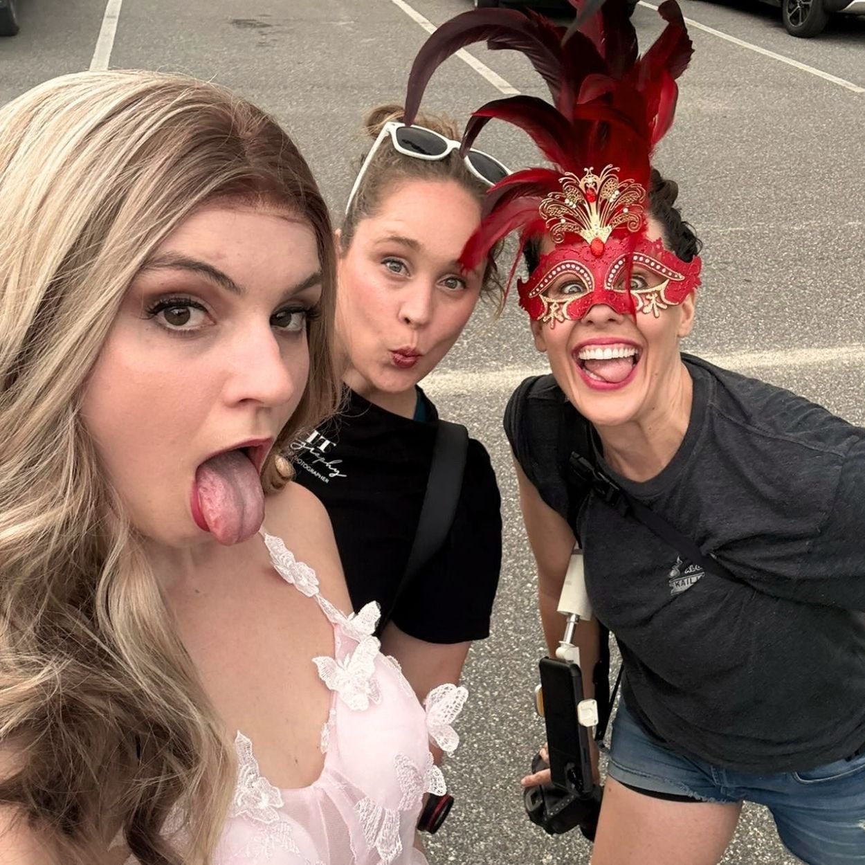 Three women taking a playful selfie together, illustrating the find your people spirit of the retreat